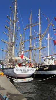 Sailing ships with lowered sails docked in Szczecin, Poland. The Tall Ship Races 2013