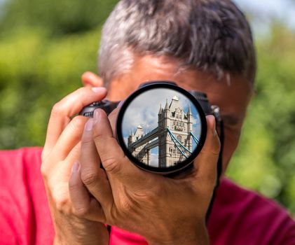 London - The Tower Bridge on the lens of a Photographer.