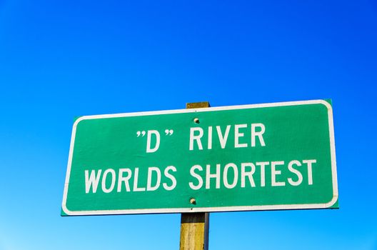Sign in Lincoln City, Oregon for the D River, the world's shortest