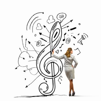 Image of woman standing with back leaning on clef