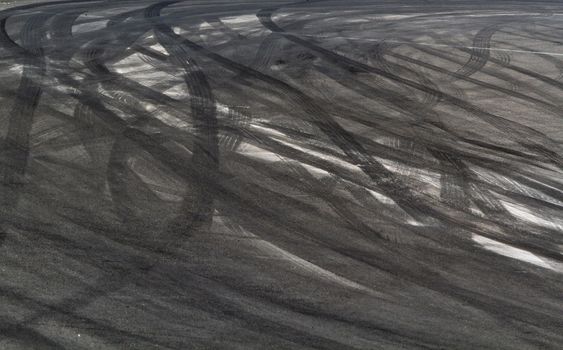 Tire marks on road track for background