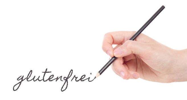 Caucasian hand with black pencil writing glutenfrei