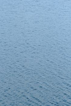 blue water surface on the wind