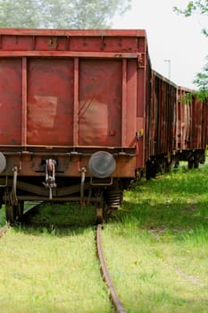 Old wagon, in an unused grassy railway track