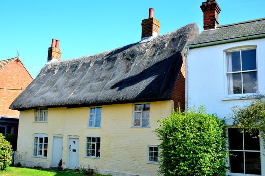 Pale yellow english cottage