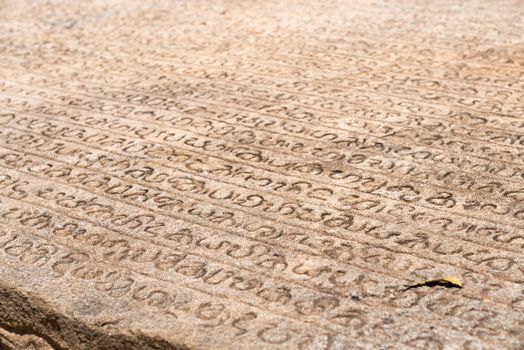 Ancient stone book with Singala characters script inscription, Polonnaruwa