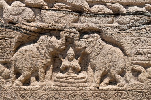 Hindu goddess of prosperity Lakshmi with two elephants (Gajalakshmi) on ancient stone book, Polonnaruwa, Sri Lanka