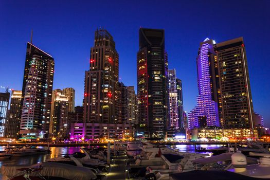 DUBAI, UAE - NOVEMBER 16: Nightlife in Dubai Marina. UAE. November 16, 2012. Dubai was the fastest developing city in the world between 2002 and 2008.