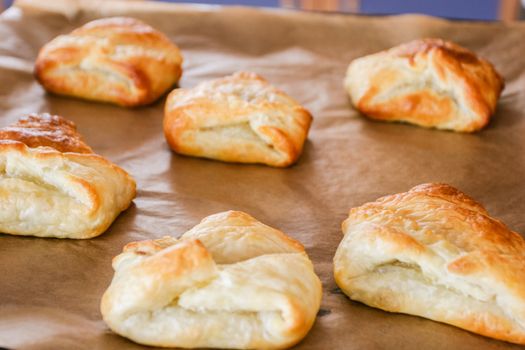 Individual-sized baked or fried buns stuffed with a variety of fillings.