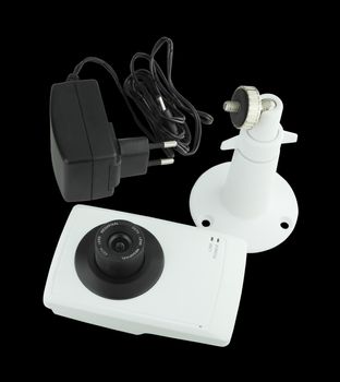 security camera with accessory on black background