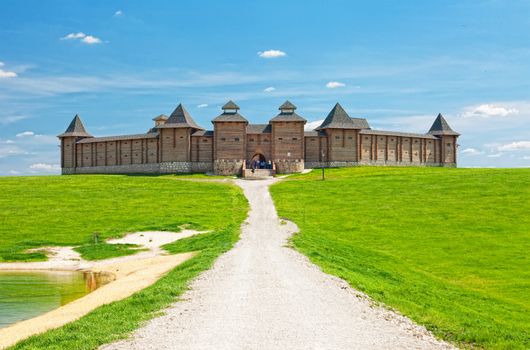 Wide dirt road to the wooden Kremlin, Russia