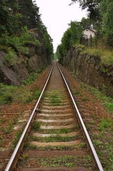 Railway tracks and gravel leading into the infinite distance