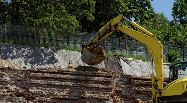 the excavator working on a construction site