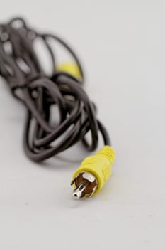 only yellow video RCA cable on a white background