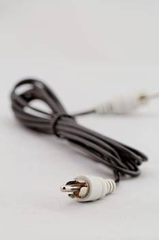 only white audio RCA cable on a white background (right)