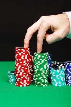 fingers, walking on a pile of playing chips