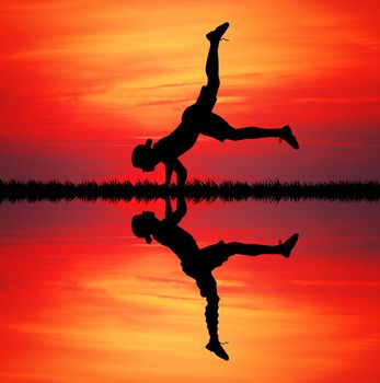 Breakdancer at sunset