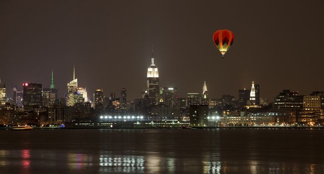 The New York City mid-town skylines at night 