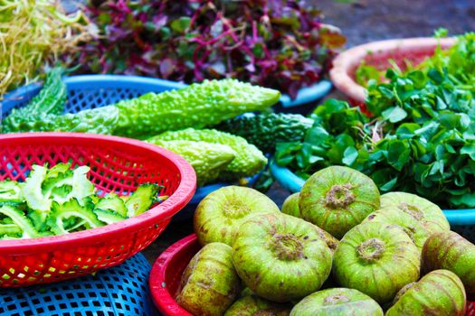 Exotic fruits and vegetables on sale at a street market in Hanoi, Vietnam