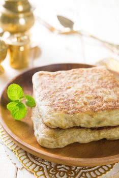 Martabak or murtabak, also mutabbaq, is a stuffed pancake or pan-fried bread which is commonly found in Saudi Arabia, Yemen, India, Indonesia, Malaysia, Thailand, Singapore, and Brunei.