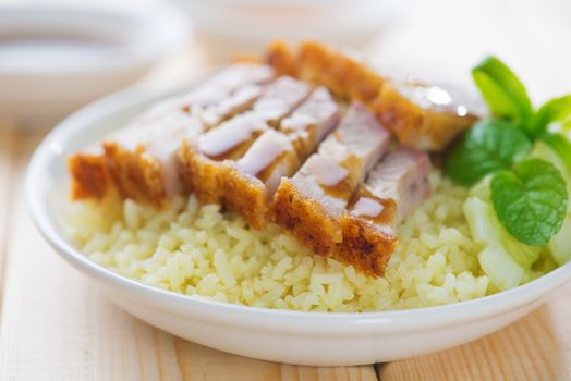 Siu Yuk - Chinese crispy roasted belly pork rice. Hong Kong cuisine.