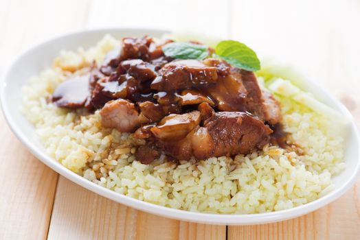 Char Siu - Chinese sticky pork spare ribs roasted with a sweet and savory sauce served with boiled rice. Barbecued pork Char Siu Rice Malaysia cuisine.