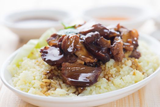 Slices of traditional Chinese marinated barbecue pork on dining table. Bbq pork Char Siew Rice Singapore cuisine.