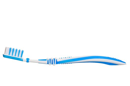 blue new toothbrush close-up on white background