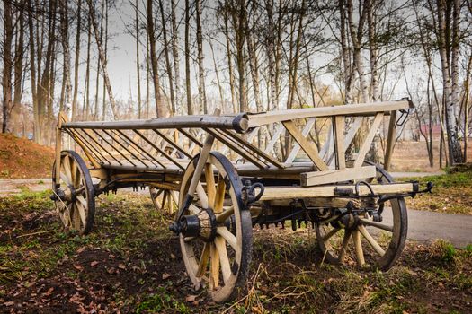 old village wagon in the autumn forest