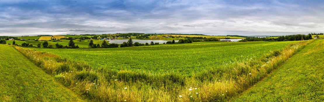 Panoramic hdr coutry view of a lake and fields in Prince Edward Island Canada
