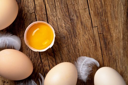 Eggs on wood background. Copy space. Top view