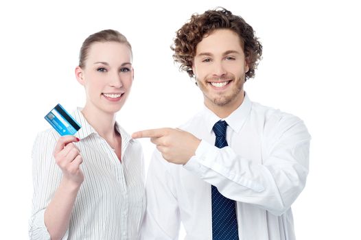 Young business executives displaying credit card