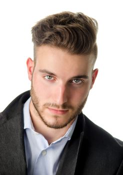 Studio portrait of attractive young man looking in camera, on white background