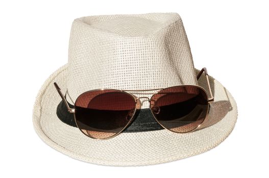 White hat with sunglasses isolated over white background.
