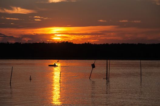 Sunset on Kisajno Lake, Masurian Lake District in Poland.