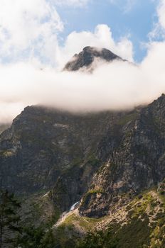 Tatra mountains, peak in the clouds in Poland.