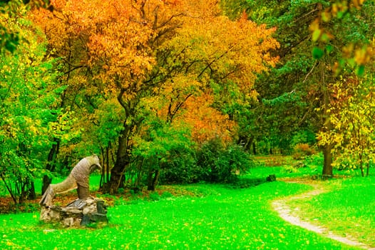 Statue in the autumn park