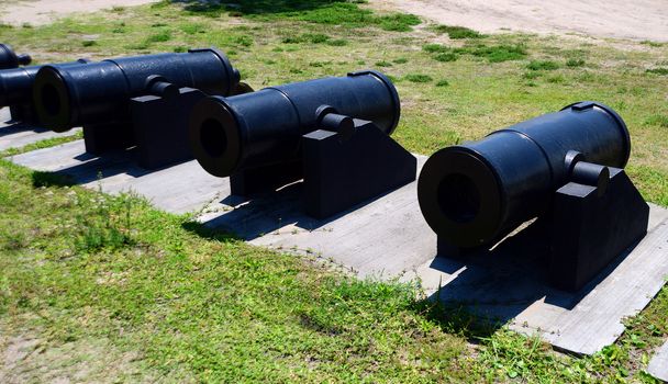 line of cannons ready for battle at Castillo de San Marcos fort