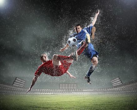 Image of two football players at stadium