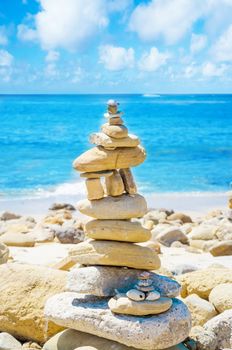 Stack of sea rocks balancing by Pacific ocean 
