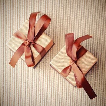 Luxury gift boxes with ribbon, retro filter effect 
