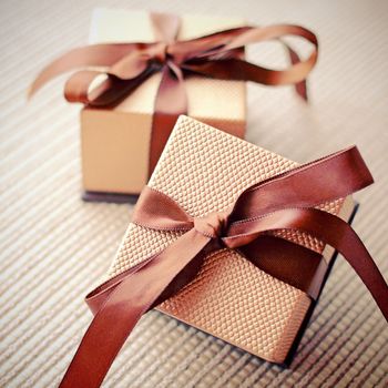 Luxury gift boxes with ribbon, retro filter effect 