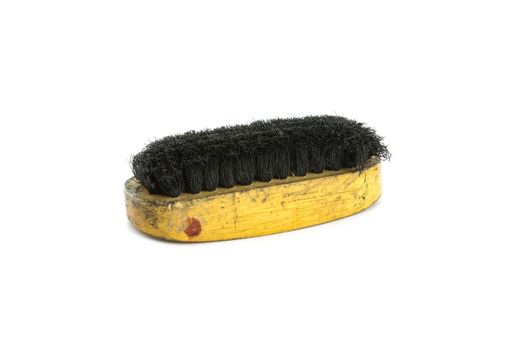 Traditional wooden shoes brush with black bristles.Isolate on white background