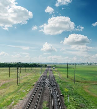 railroad to horizon and clouds on sky