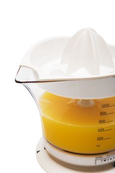 Modern juice extractor on a white background