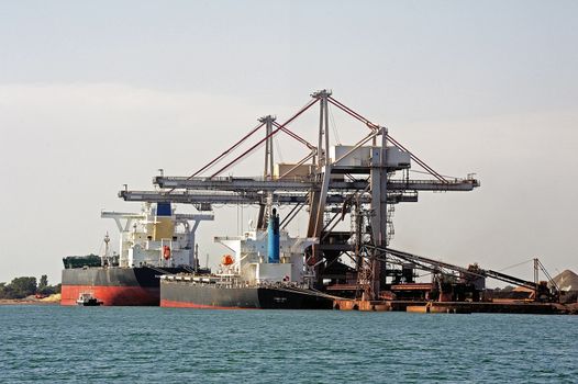 unloading of an ore cargo liner for the steel-works at Fos-sur-Mer beside Marseilles.