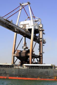 unloading of an ore cargo liner for the steel-works at Fos-sur-Mer beside Marseille.