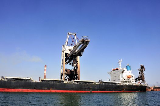 unloading of an ore cargo liner for the steel-works at Fos-sur-Mer beside Marseille.