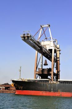 unloading of an ore cargo liner for the steel-works at Fos-sur-Mer beside Marseille.