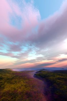 A dry river bed winds its way down through a wilderness area.